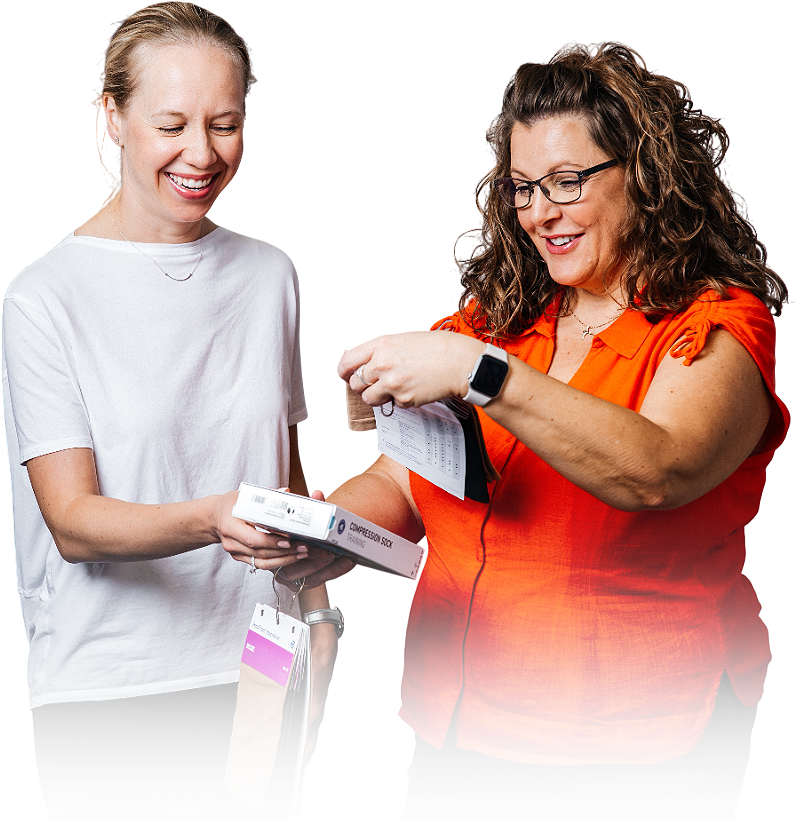 Compression Socks in Barrie Therapist is showing compession socks to client